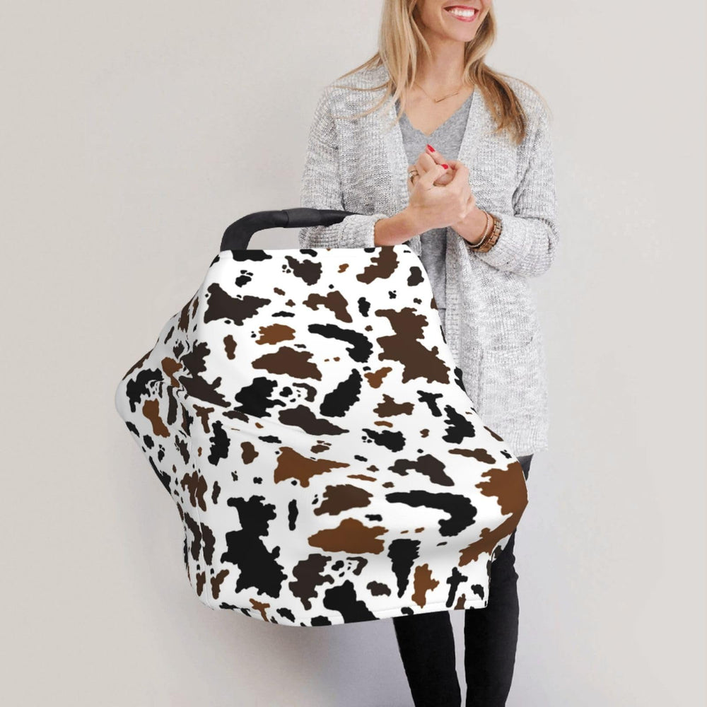 Sozzjile brown cow print nursing cover offers versatile privacy and comfort for feeding.