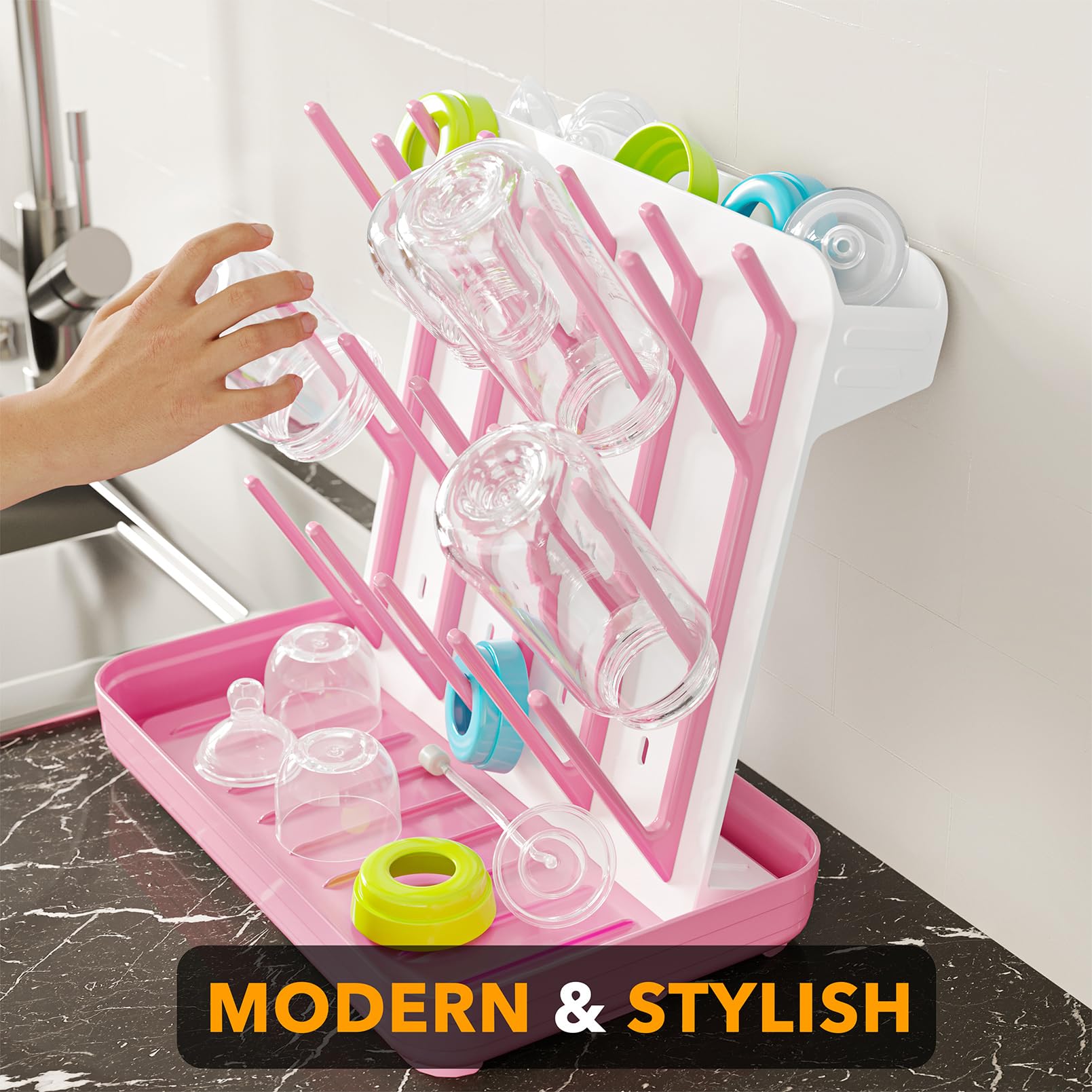 SpaceAid pink and white drying rack holds lids, cups, and pacifiers for quick access