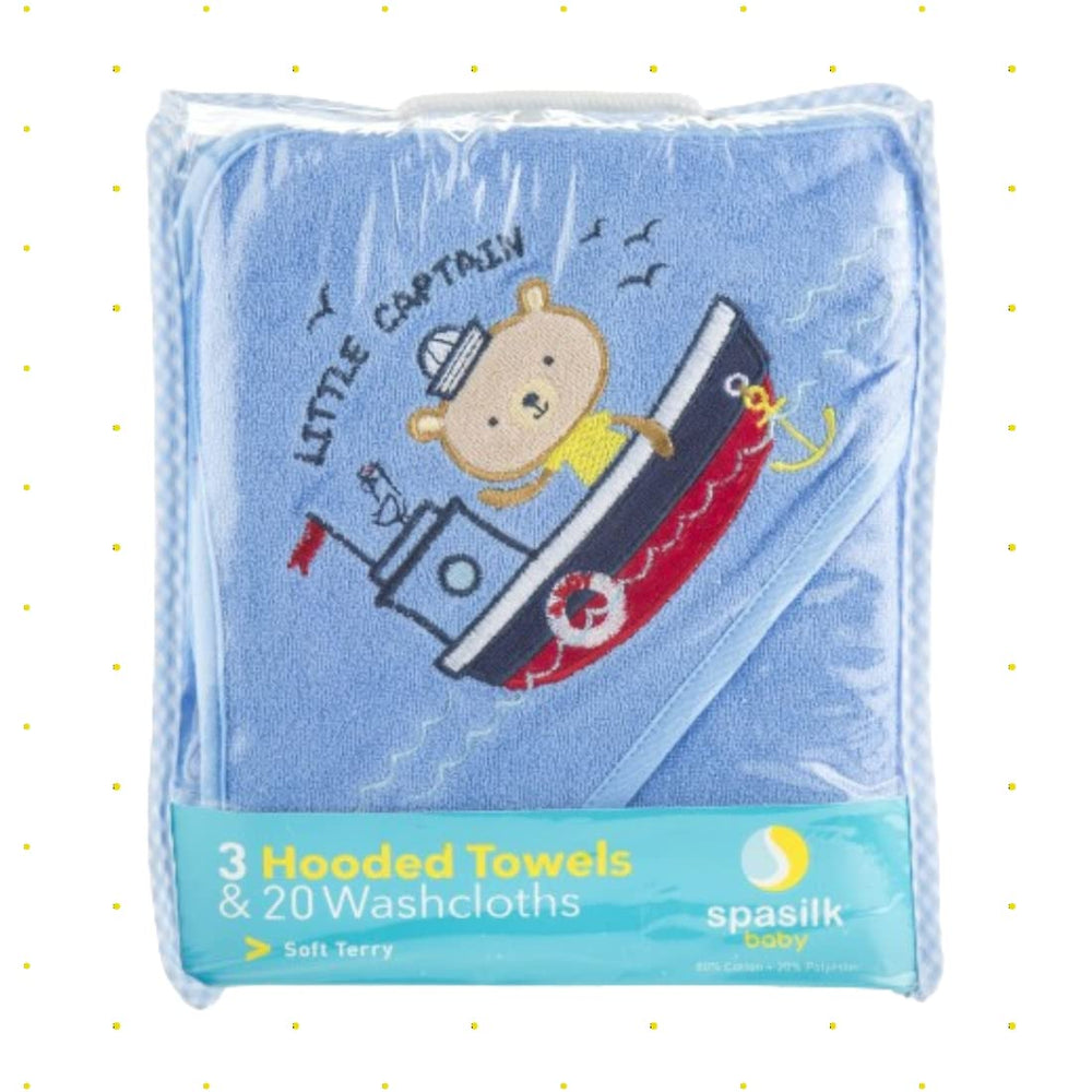 Spasilk hooded towel navy nautical on crib; absorbs moisture and keeps baby cozy.