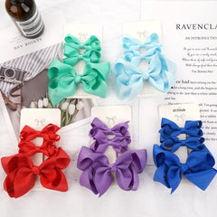 Spenlly green bows styled in pigtails for a cute everyday look
