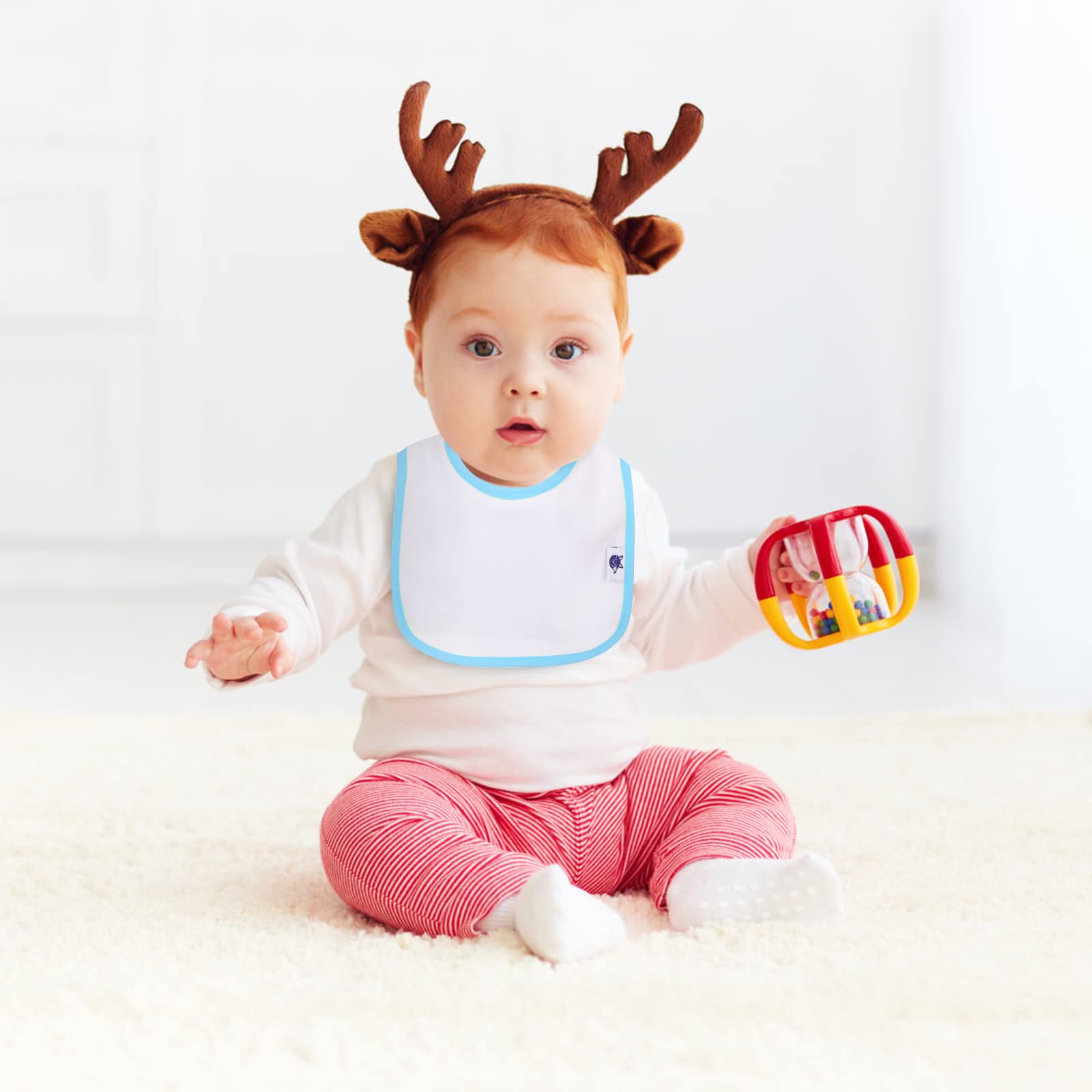 SPINFOX 0-12 months size bibs for growing infants.