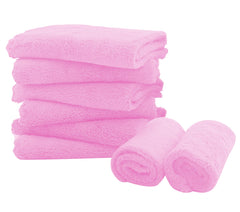Spotted Play 8-pack burp cloths close-up showing ultra-absorbent coral fleece for mess control.