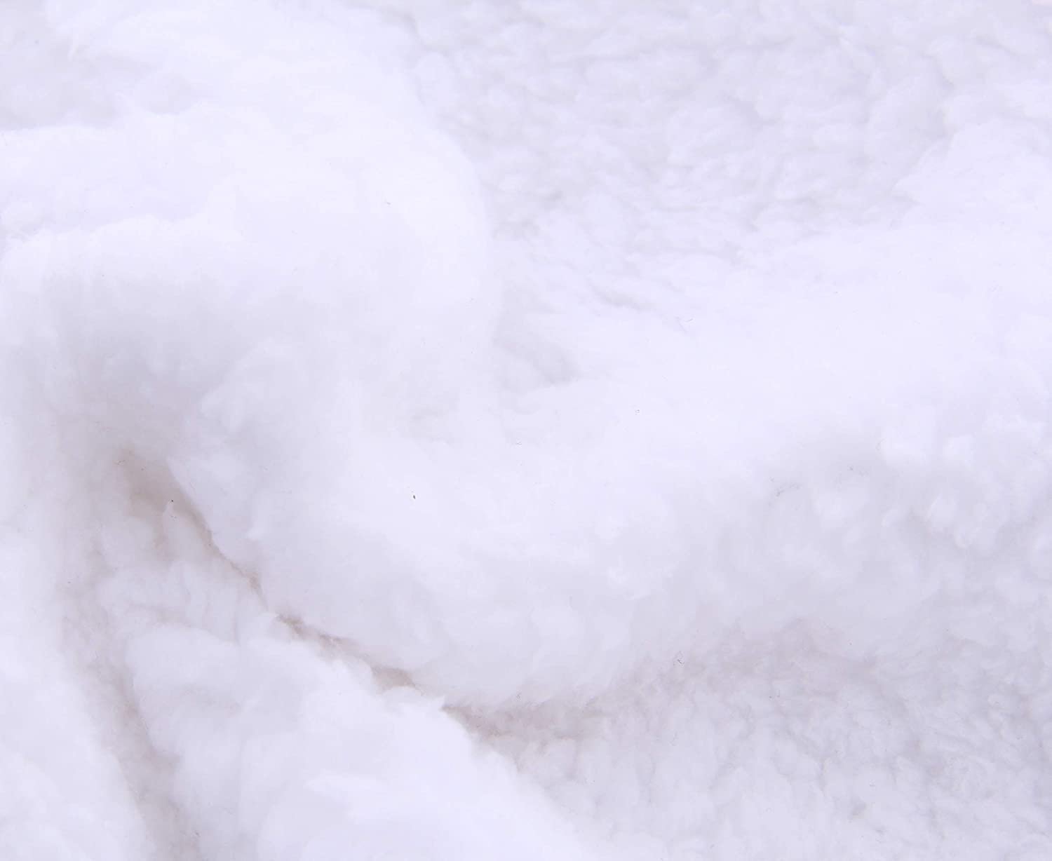 Spotted Play sherpa swaddle blanket pink-white plush fabric close-up