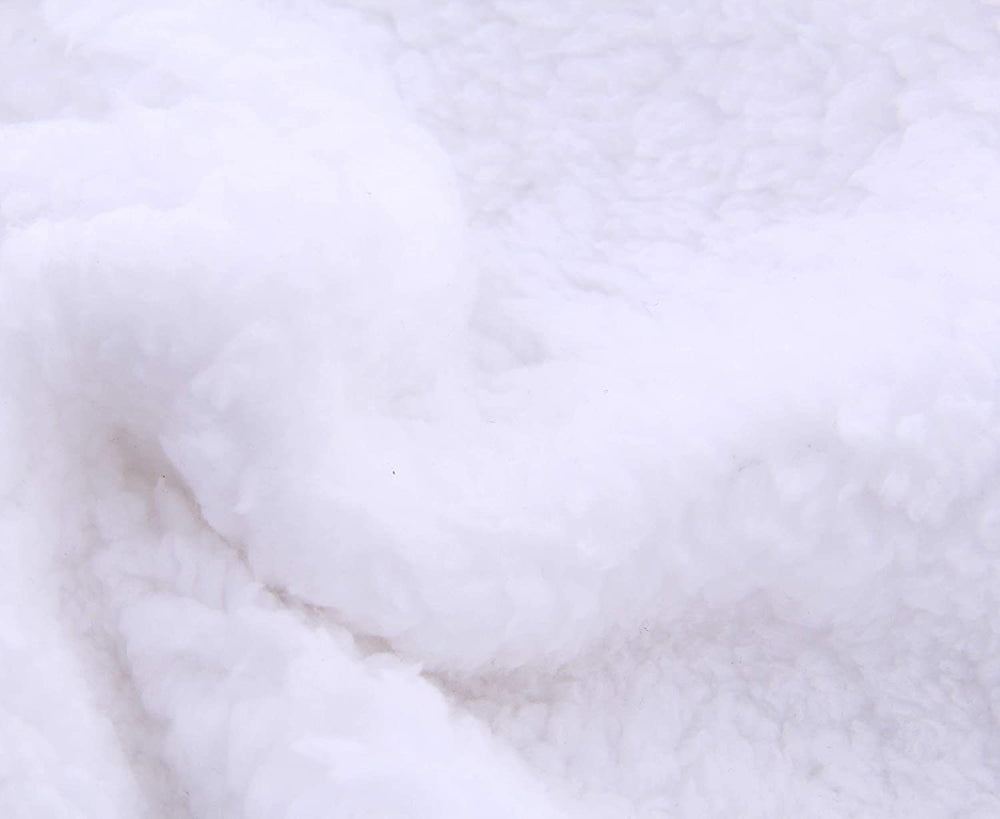 Spotted Play sherpa swaddle blanket pink-white plush fabric close-up
