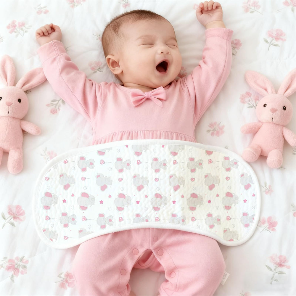 Spriggenix burp cloth lifestyle shot demonstrates versatile use during cuddles.