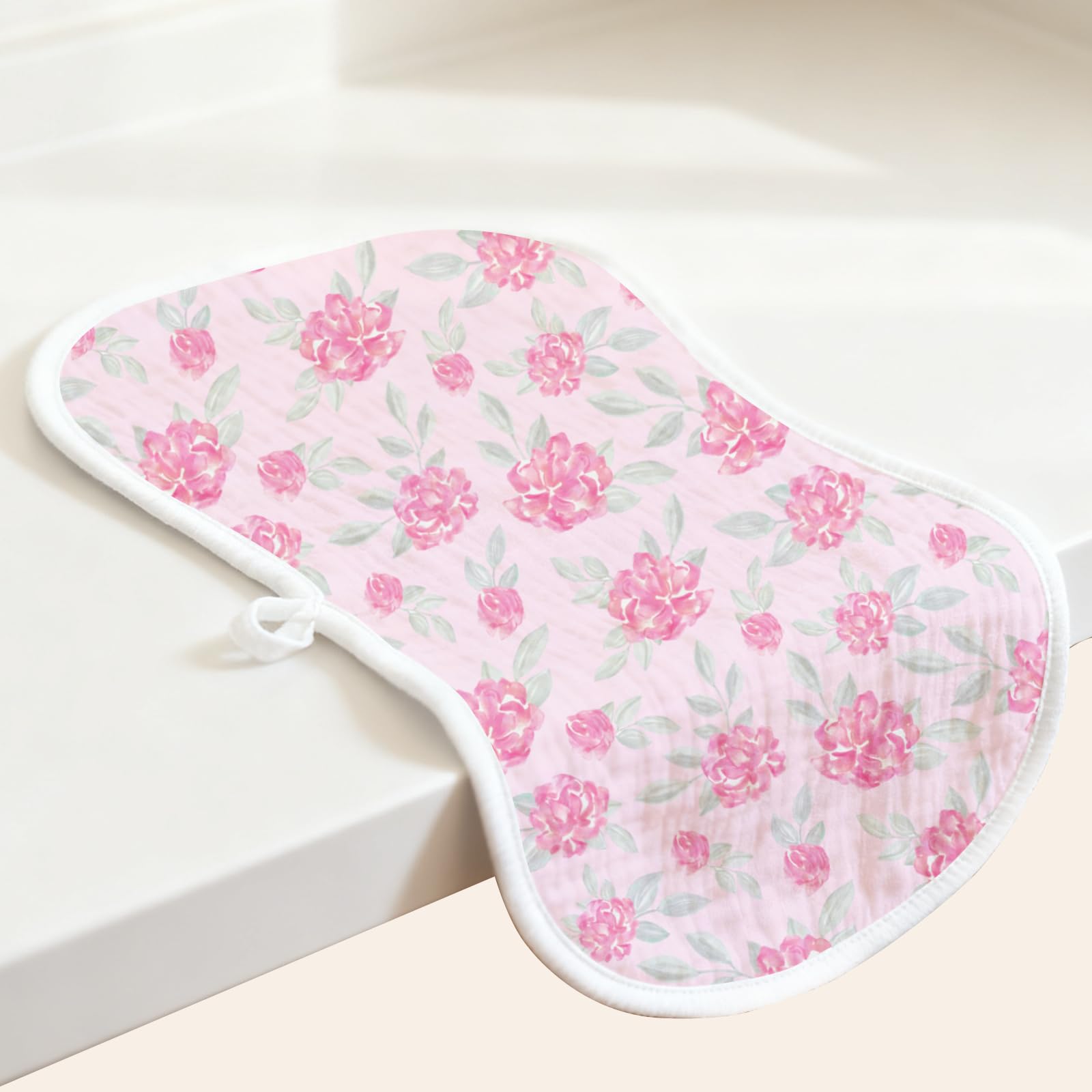 Spriggenix pink elephant-pattern burp cloth complements baby outfits.