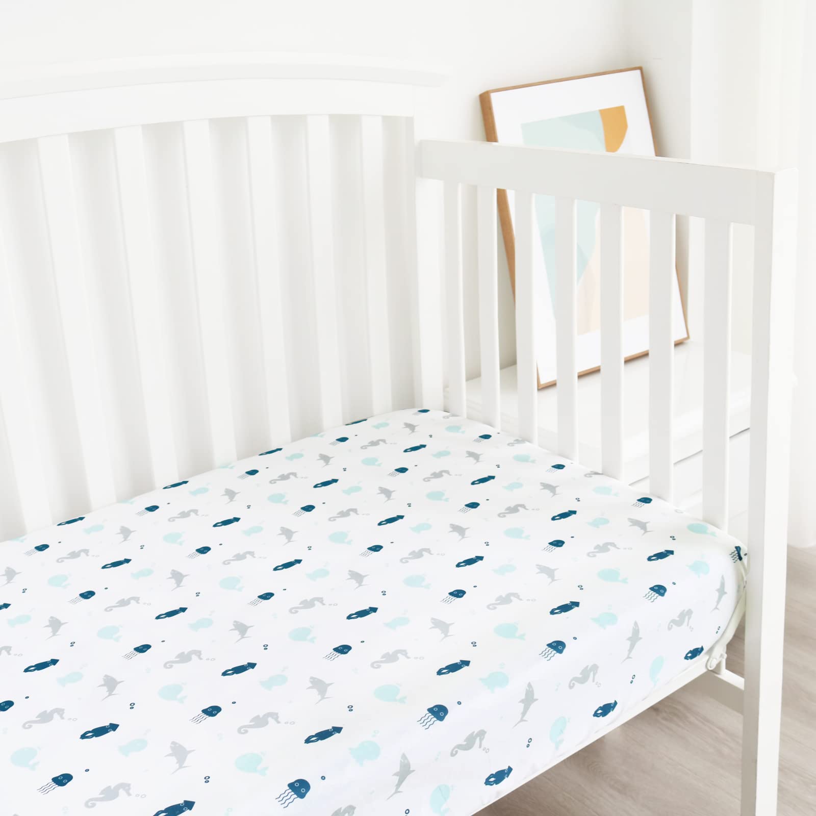 SPRINGSPIRIT bedroom scene with crib sheets showcasing neutral design