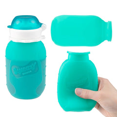 Squeasy Snacker Aqua 6oz no-spill lid insert demonstrates controlled flow and leak prevention