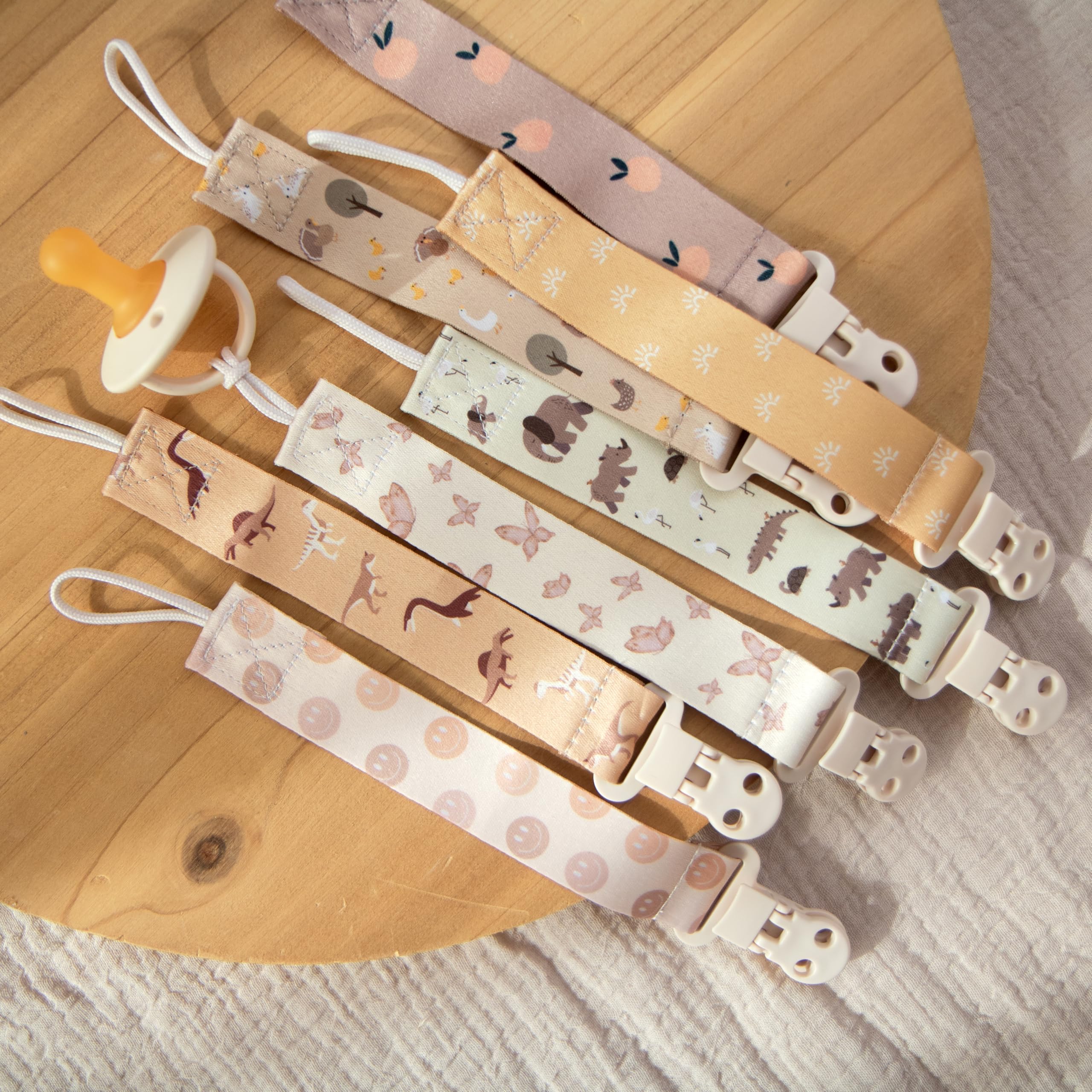 Stadela binky holder is machine washable for easy cleanup after messes.