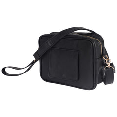 STAËLL crossbody diaper bag with wipes dispenser keeps wipes handy on the go