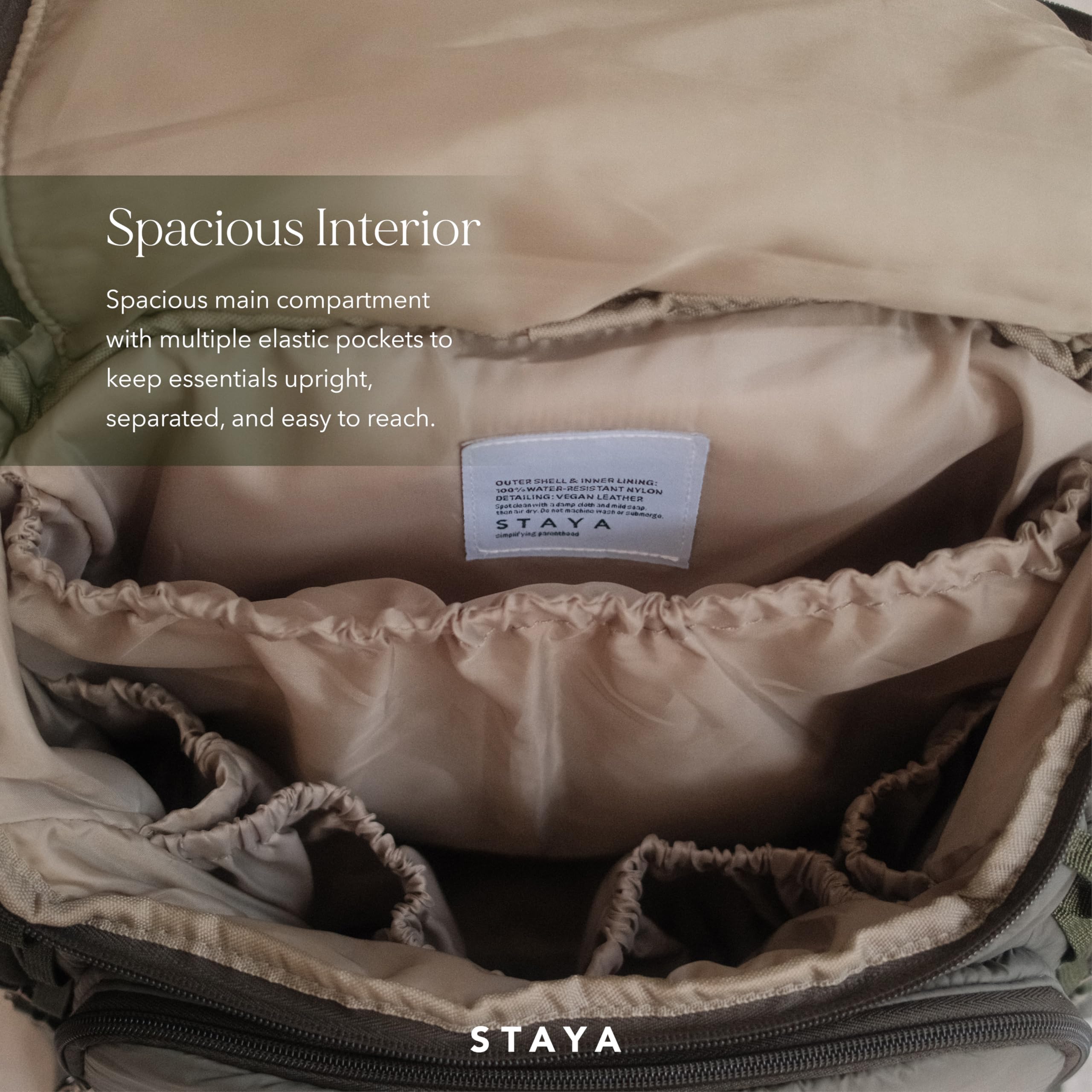 Staya Cloud Diaper Bag Sage detachable strap provides versatile carrying options