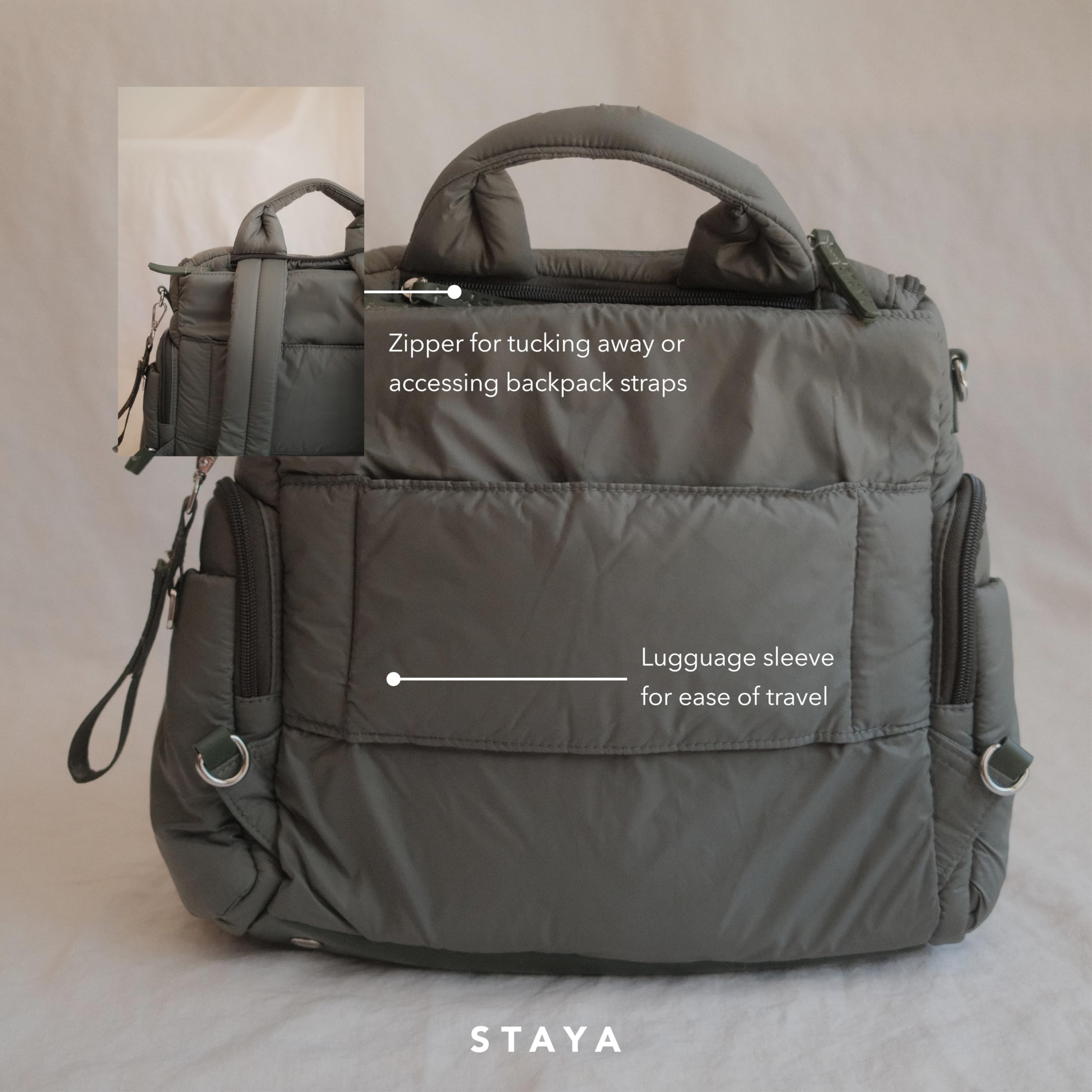 Staya Cloud Diaper Bag Sage water-resistant nylon withstands weather and spills