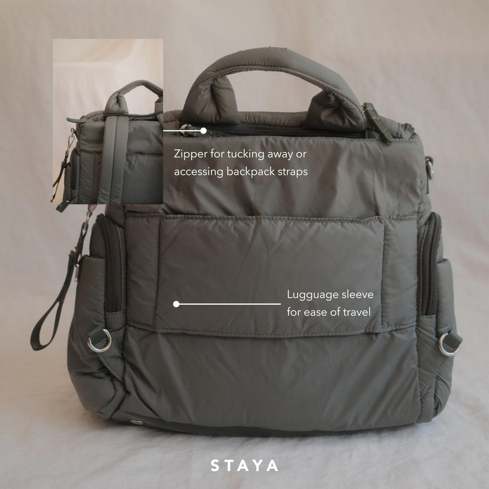 Staya Cloud Diaper Bag Sage water-resistant nylon withstands weather and spills