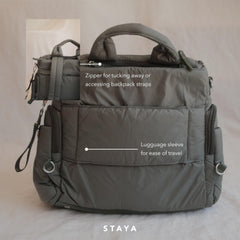 Staya Cloud Diaper Bag Sage water-resistant nylon withstands weather and spills