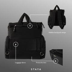 Staya Large Diaper Bag Backpack luggage sleeve enables hands-free travel comfort.