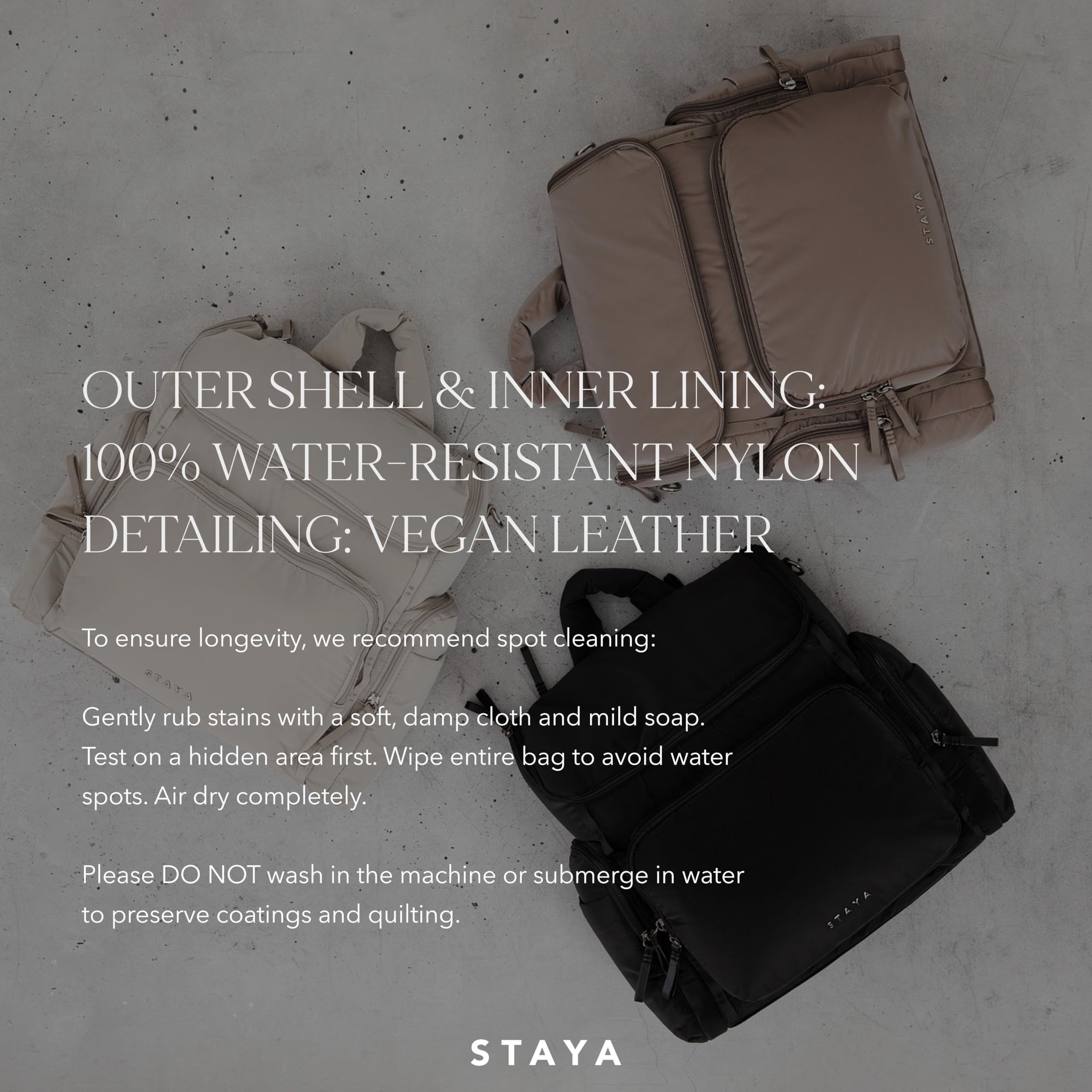 Staya Large Diaper Bag Backpack water-resistant nylon protects gear in rain or spills.