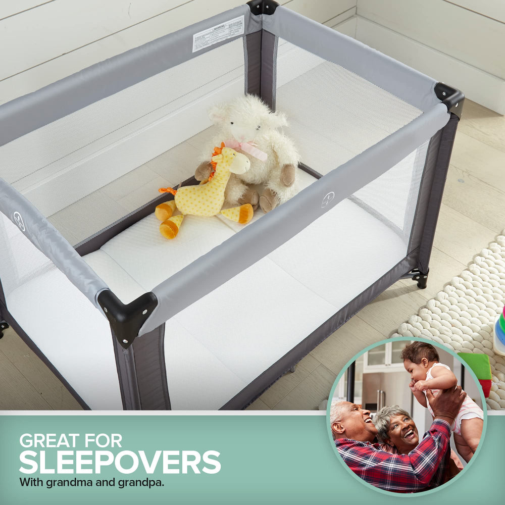Stock Your Home pack n play setup in room shows ready to use portable play area