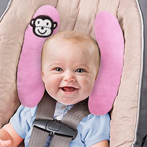 Adjustable StoHua pink neck pillow helps keep baby's head comfortable during naps.