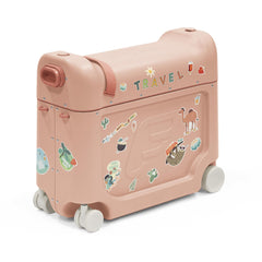 Stokke JetKids BedBox coral pink front view—ride-on luggage for easy airport maneuvering
