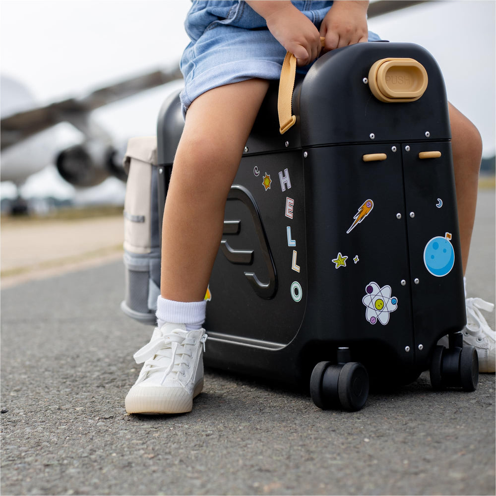 Stokke JetKids BedBox ride-on suitcase enables playful travel and a convertible rest option