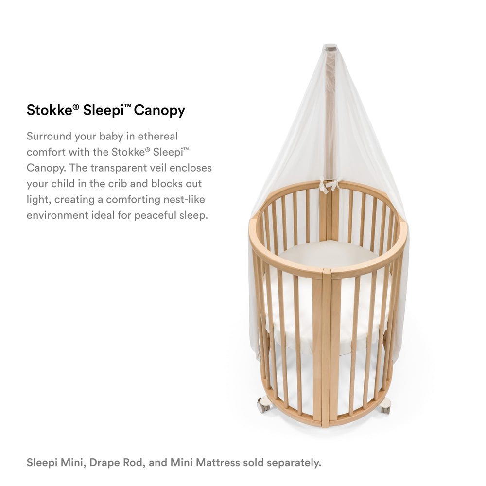 Stokke Sleepi Canopy V3 white pleated detail adds Scandinavian charm to nursery.