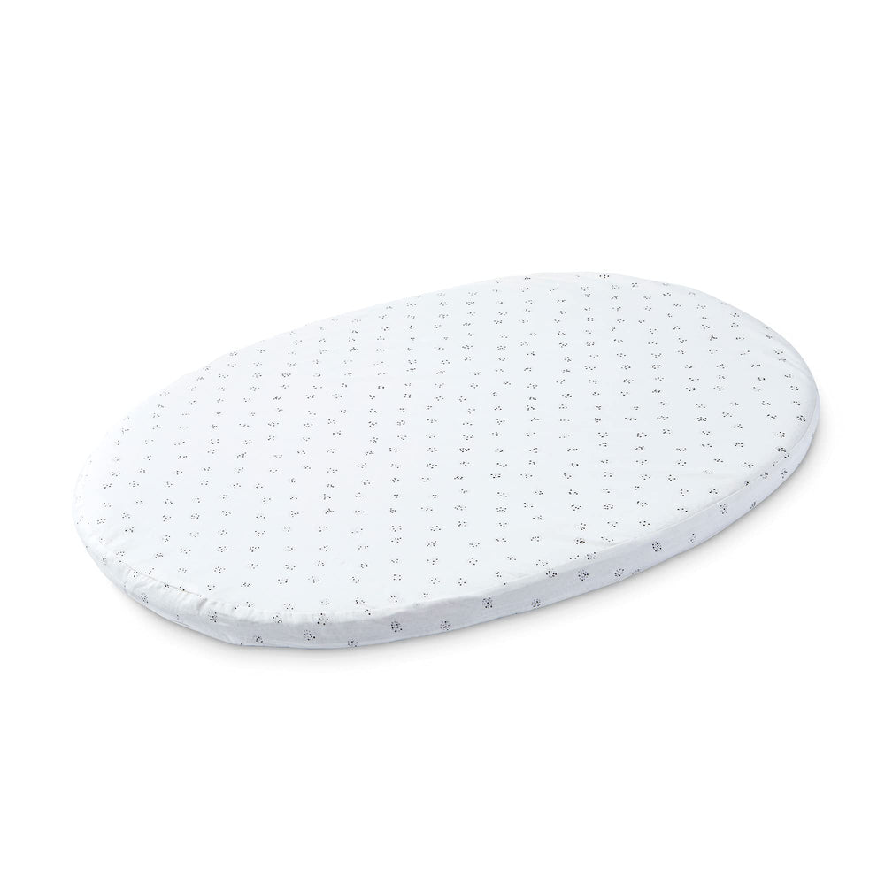 Stokke Sleepi Mini fitted sheet Grey Dotty folded, premium organic cotton for gentle baby comfort.