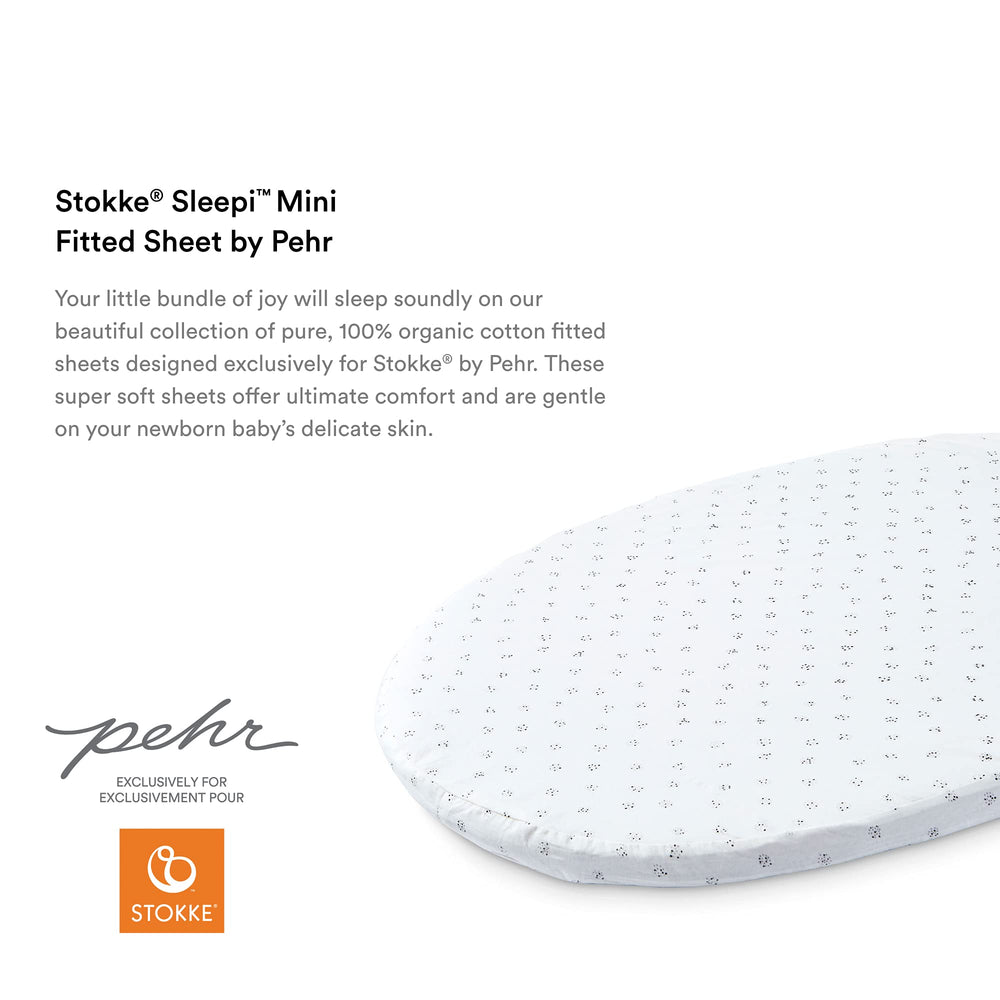 Stokke Sleepi Mini fitted sheet zipper safety closeup demonstrates snug fit for safe sleep.