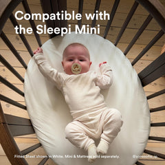 Stokke Sleepi Mini Fitted Sheet V3 on Sleepi mattress highlights secure zippered fit for safe sleep.