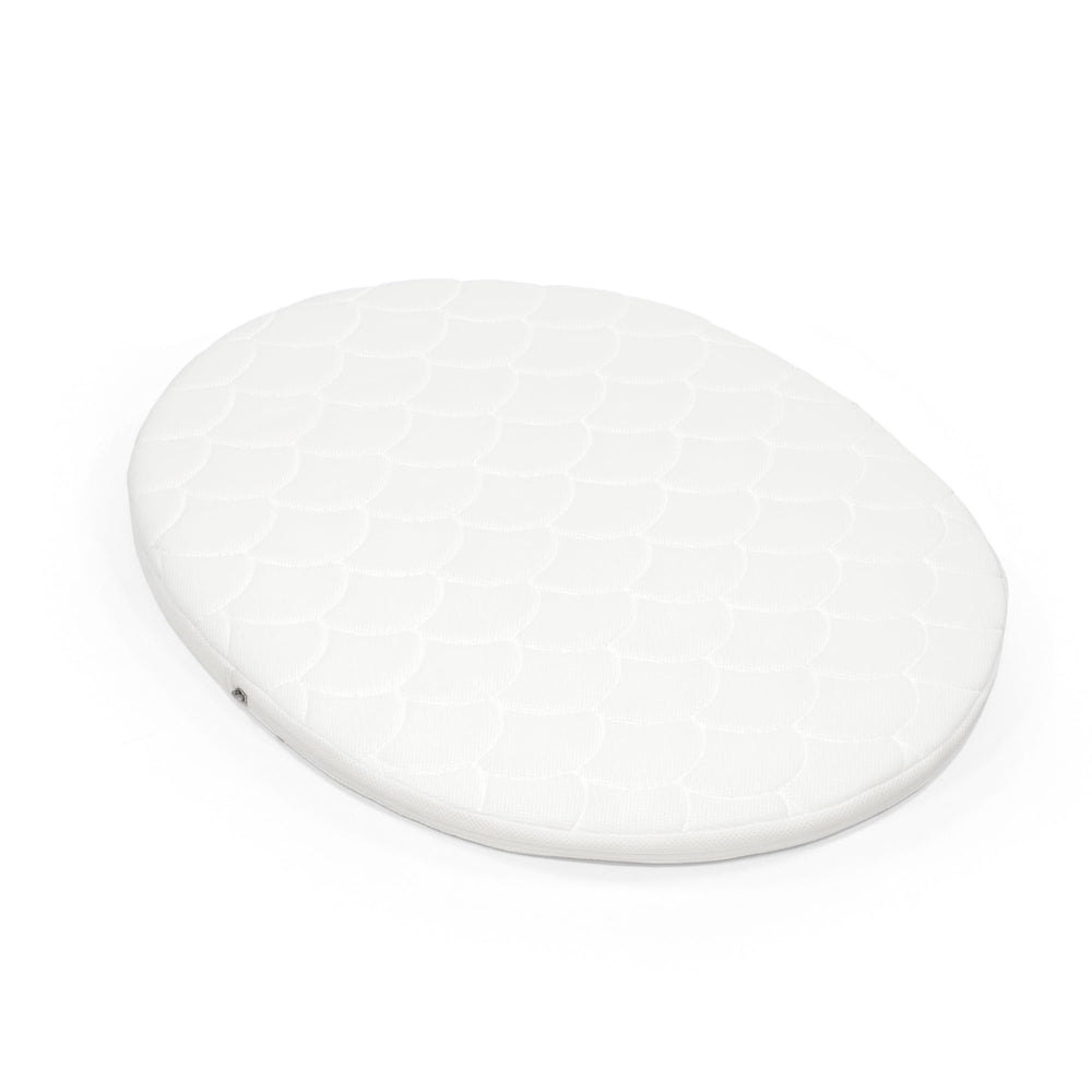 Stokke Sleepi Mini Mattress with breathable 3D mesh promoting airflow and comfort.