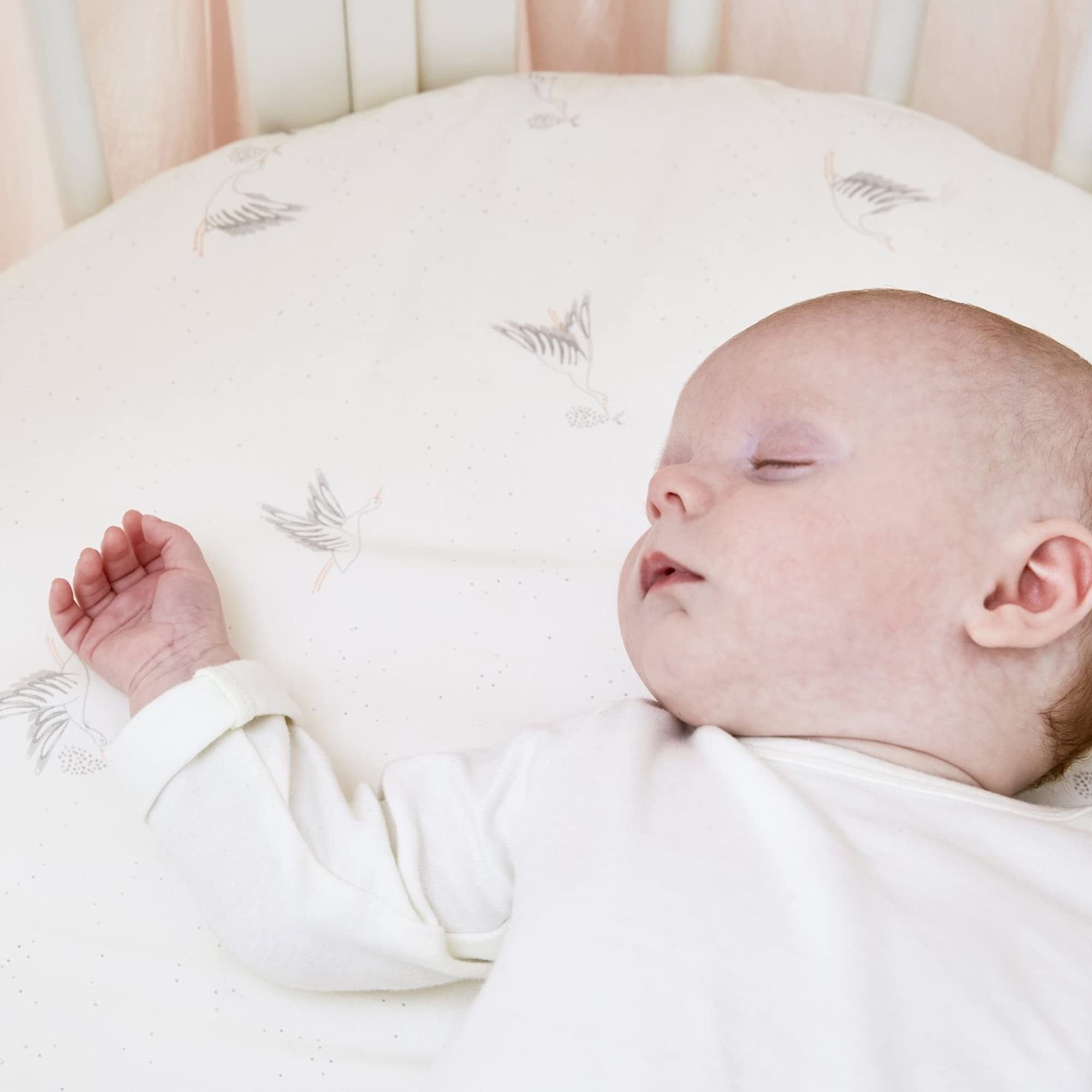 Stokke Sleepi Mini oval mattress fit ensures snug, secure sleeping surface.