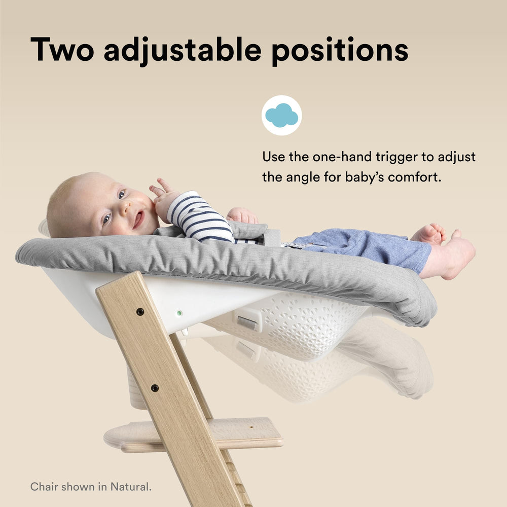 Stokke Tripp Trapp chair white adjustable seat and footplates support growth.