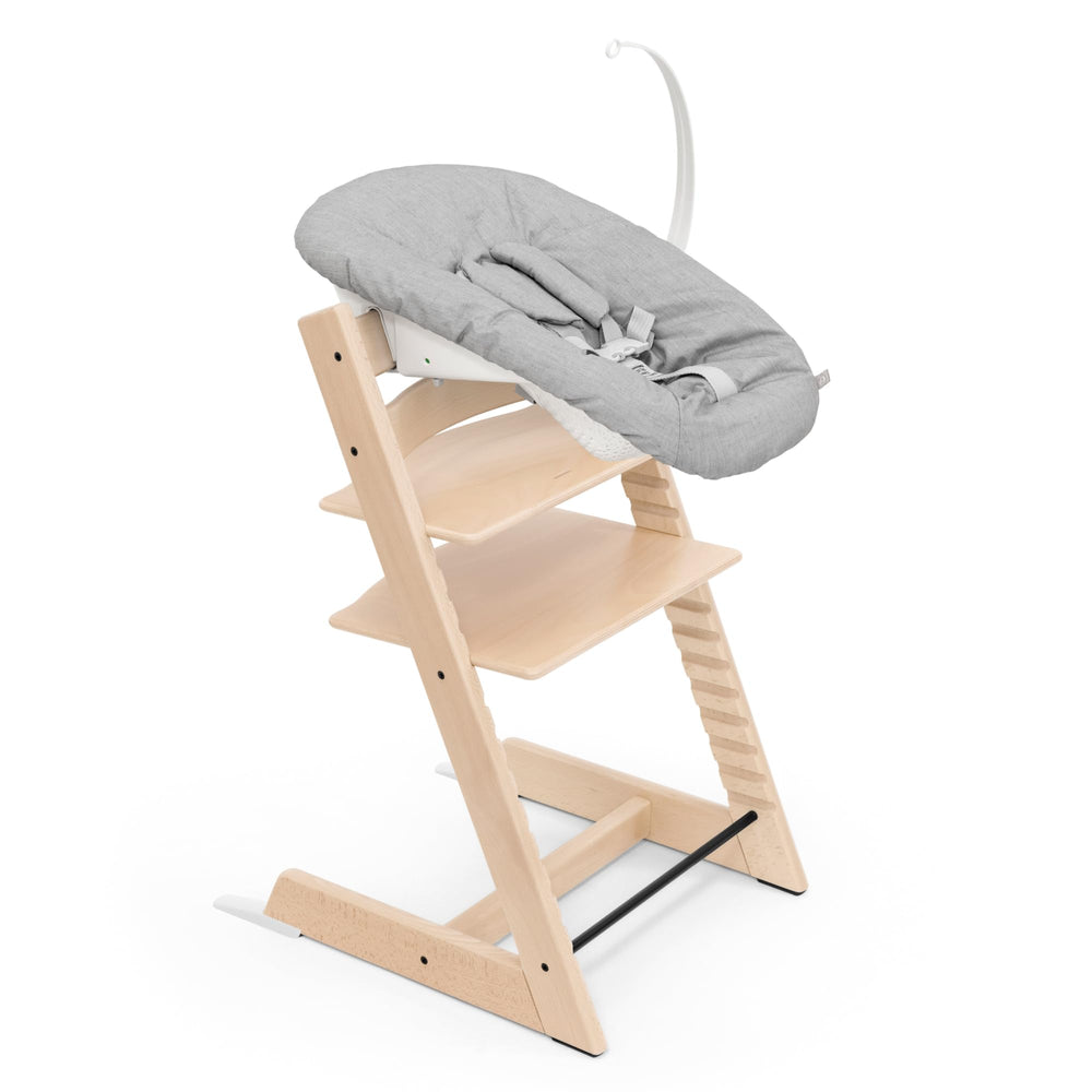 Stokke Tripp Trapp chair white side view showing table-ready design
