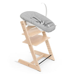 Stokke Tripp Trapp chair white side view showing table-ready design