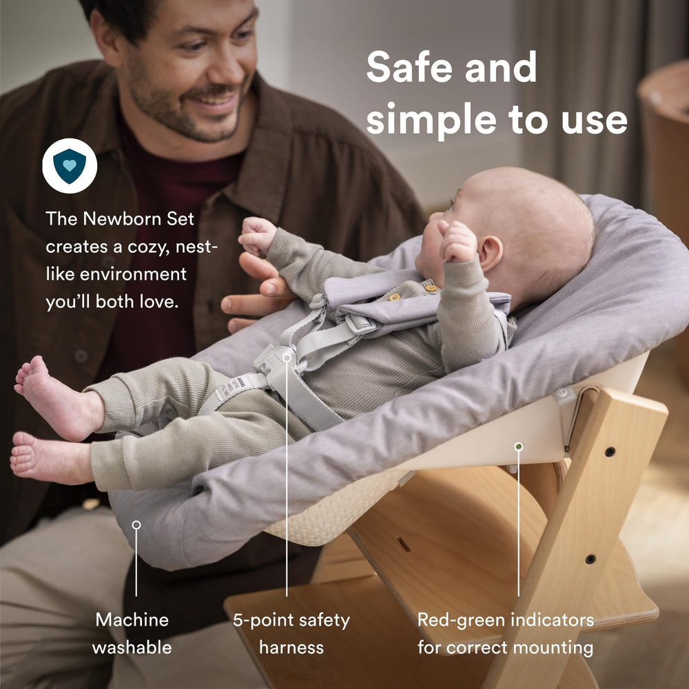 Stokke newborn set grey harness provides snug birth-to-20 lbs seating.