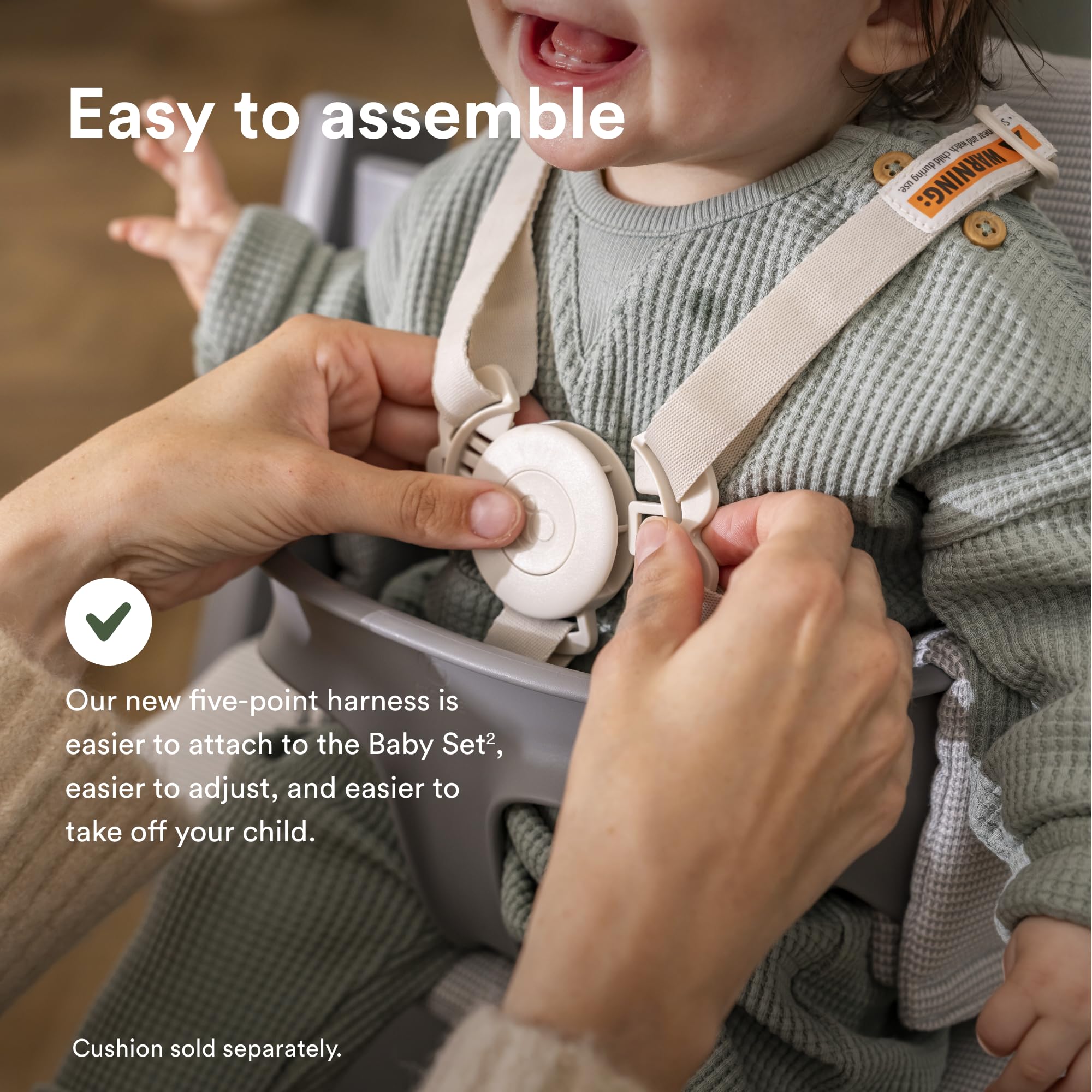 Stokke Tripp Trapp stability gliders enhance steadiness.