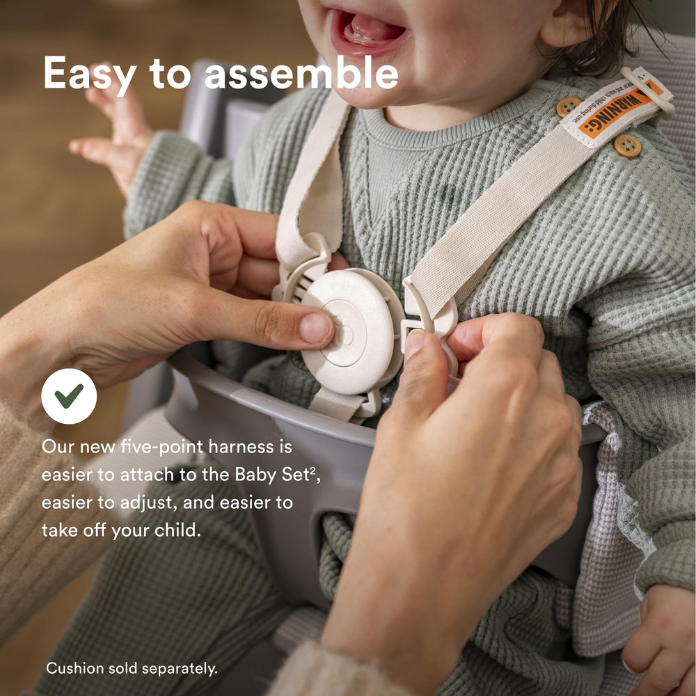 Stokke Tripp Trapp stability gliders enhance steadiness.