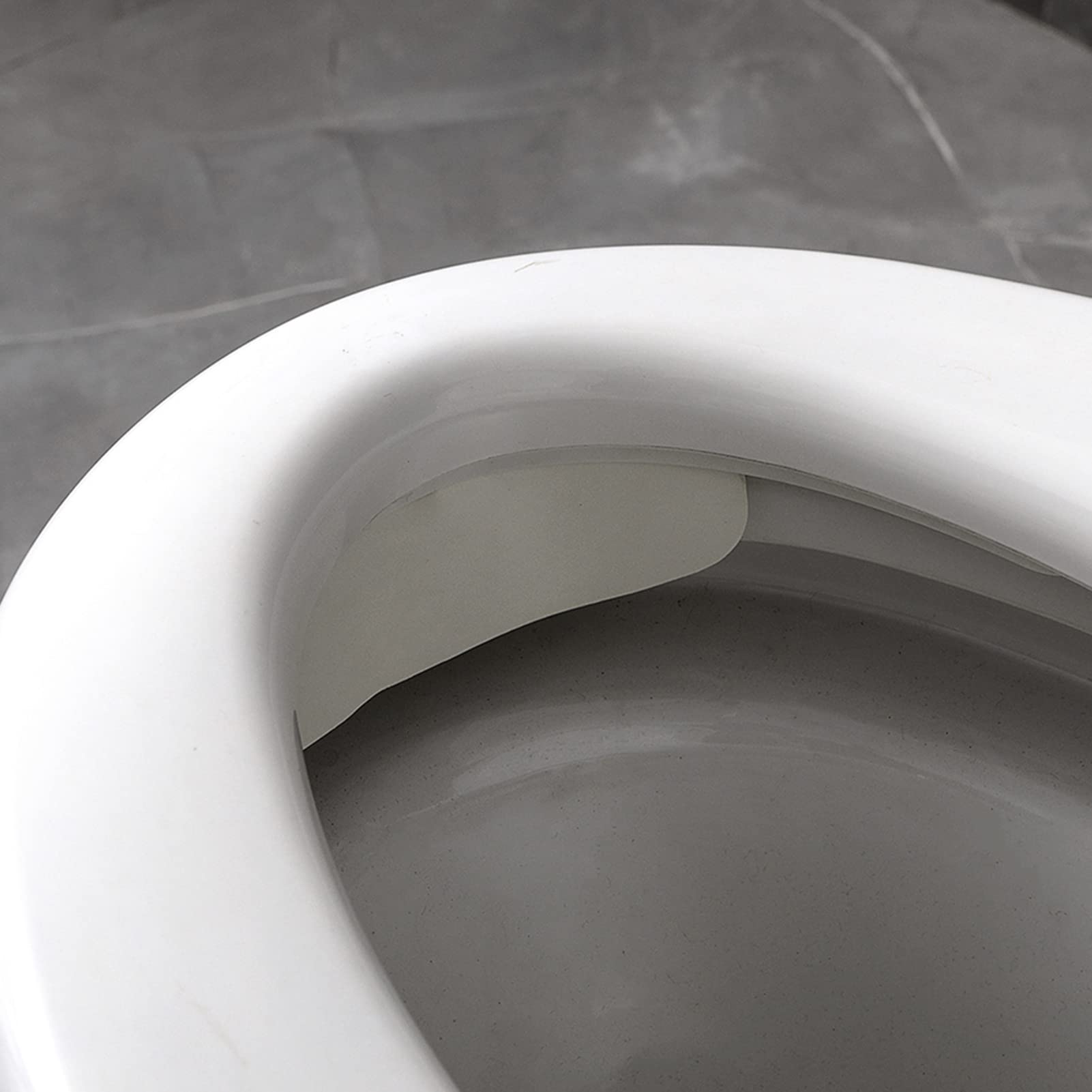 Storchenbeck urine deflector with suction cups for secure, reusable protection