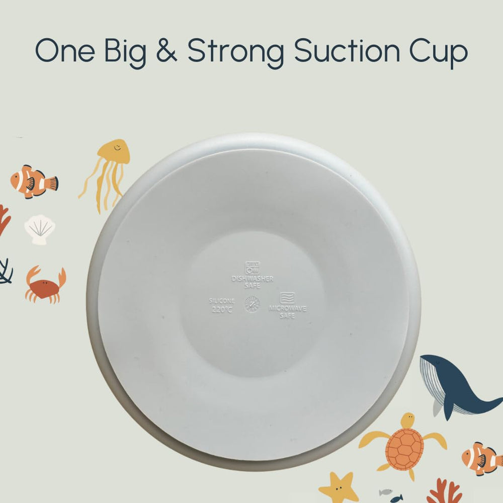 Studio Merveille baby eating with silicone plate for easy self-feeding