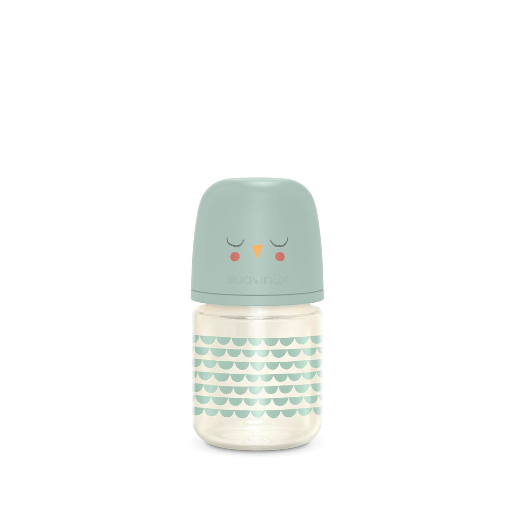 Suavinex Bonhomia glass bottle 4oz mint in hand, ideal newborn feeding option.