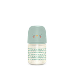 Suavinex Bonhomia glass bottle 4oz mint in hand, ideal newborn feeding option.