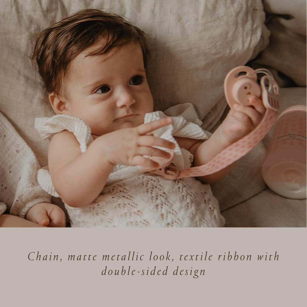 Suavinex Bonhomia premium double sided ribbon showcases reversible styling for outfits.