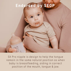 Suavinex Zero Zero bottle-compatibility image emphasizes seamless Zerø.Zerø switch between bottle and pacifier.