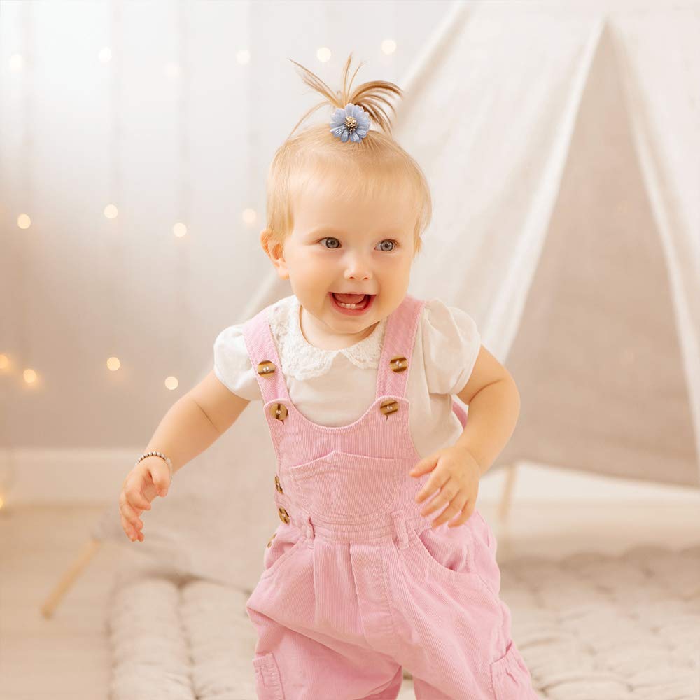 Subesty infant headband enhances photoshoots with colorful accents.