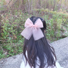 Sugarmelon baby hair clip with alligator clip close-up for secure hold.