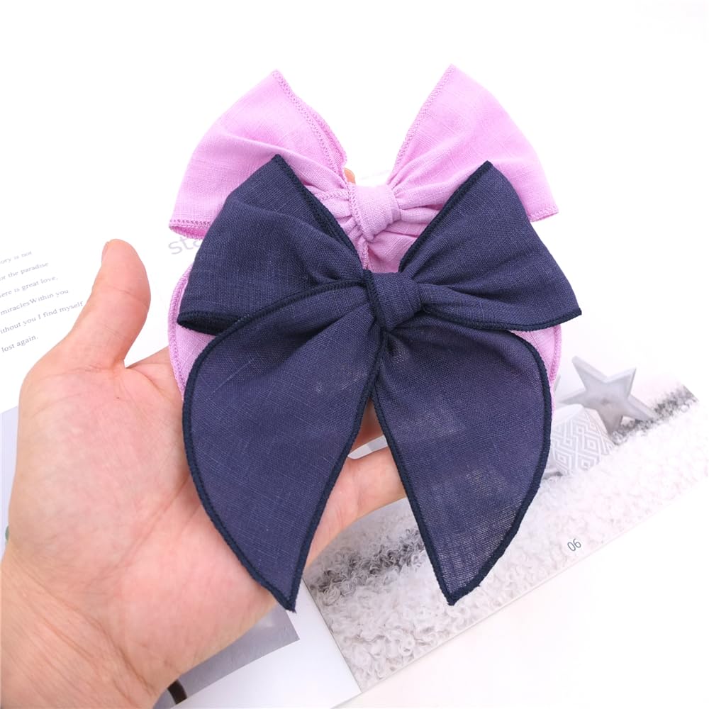 Sugarmelon Fable Bow alligator-clip attachment ensures easy secure styling.