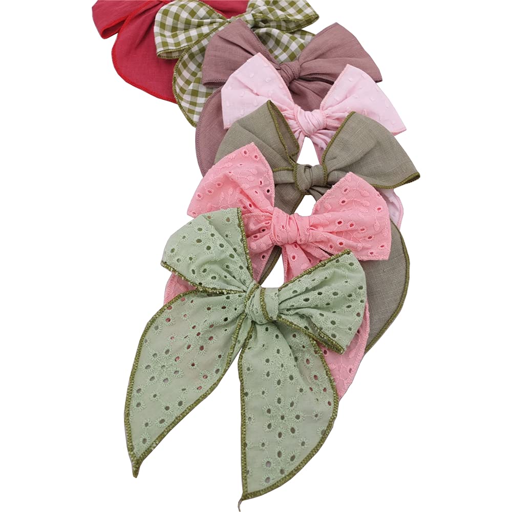 Sugarmelon Fable Bow Avocado Blue used as family photo prop.