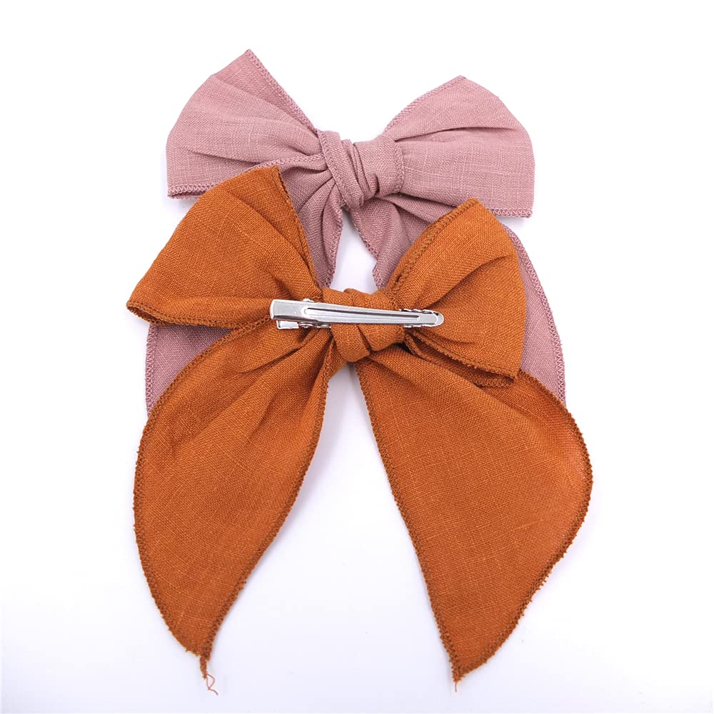 Sugarmelon Fable Bow Avocado Blue worn by mom illustrates stylish accessory for adults.