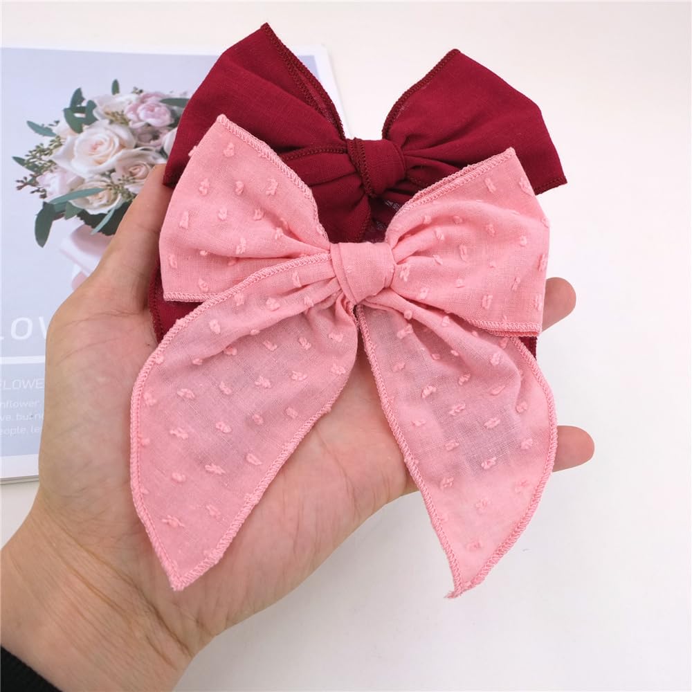 Sugarmelon Fable Bow closeup soft fabric on alligator clip for secure hold.