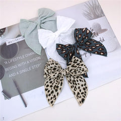 Sugarmelon fable bow leopard close-up shows soft linen fabric.