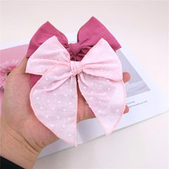 Sugarmelon fable bow worn with outfits illustrates versatile styling for any occasion.